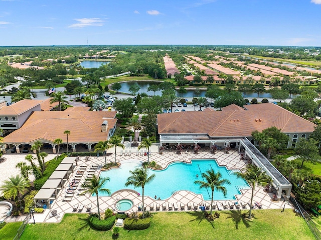 drone / aerial view with a water view