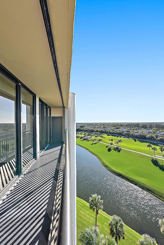 balcony featuring a water view