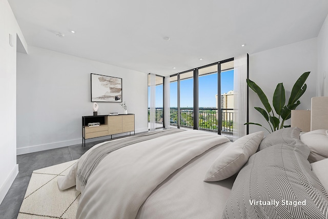 bedroom featuring recessed lighting, baseboards, finished concrete flooring, access to outside, and floor to ceiling windows