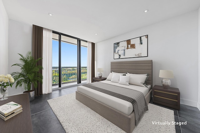 bedroom with finished concrete flooring, baseboards, access to outside, expansive windows, and recessed lighting