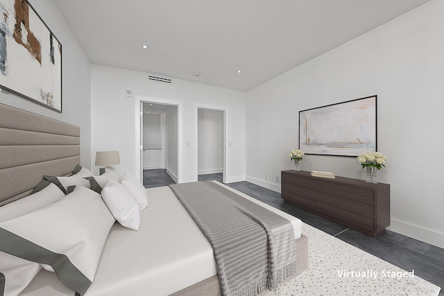 bedroom with baseboards, visible vents, and recessed lighting