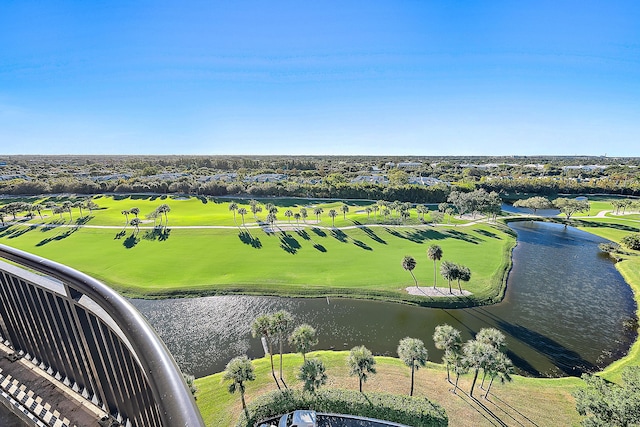 birds eye view of property featuring view of golf course and a water view