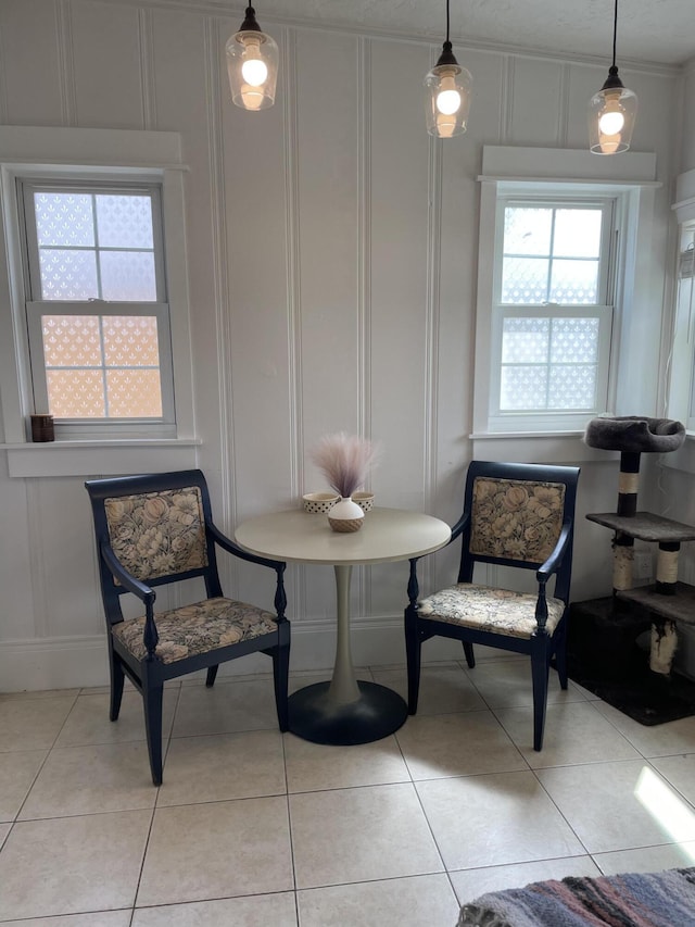 sitting room featuring light tile patterned flooring