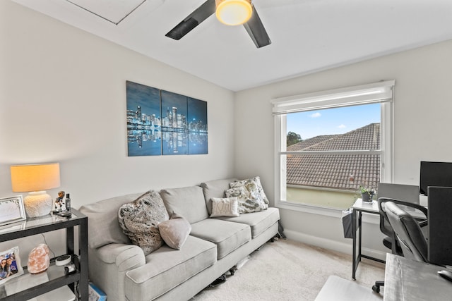 office space with carpet flooring and ceiling fan