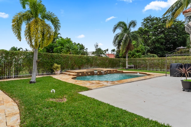 view of pool featuring a patio area, an in ground hot tub, and a yard