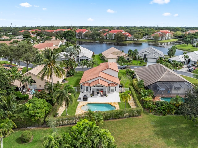 birds eye view of property featuring a water view