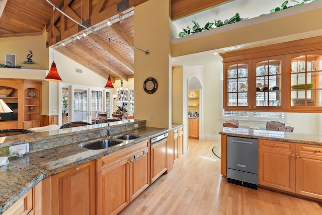 kitchen with hanging light fixtures, wooden ceiling, beamed ceiling, light hardwood / wood-style floors, and stone countertops