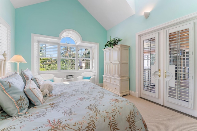 bedroom with access to outside, french doors, high vaulted ceiling, and light colored carpet