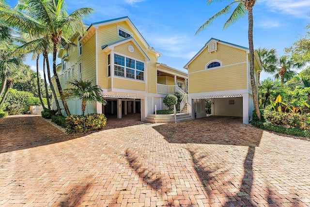 view of front of home featuring a carport