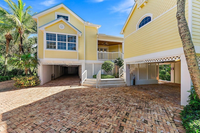 view of front of property with a carport