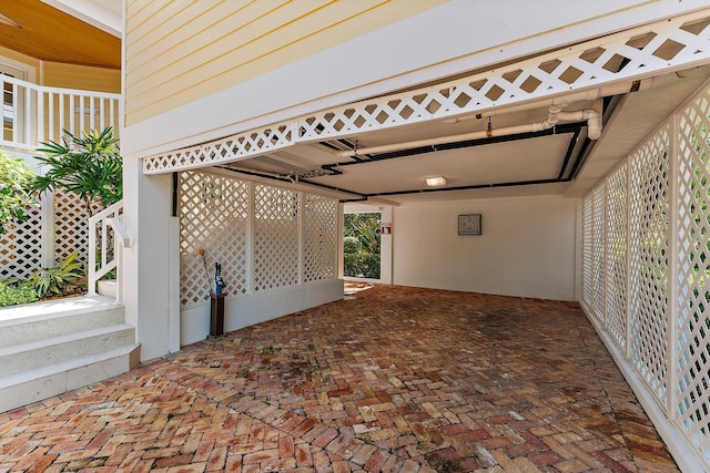 view of patio / terrace featuring a carport