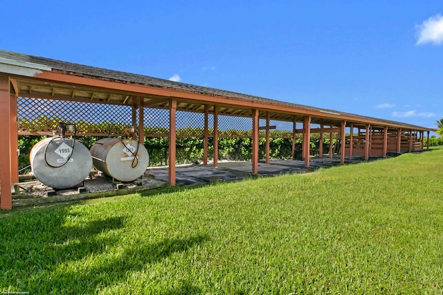 view of property's community featuring a lawn