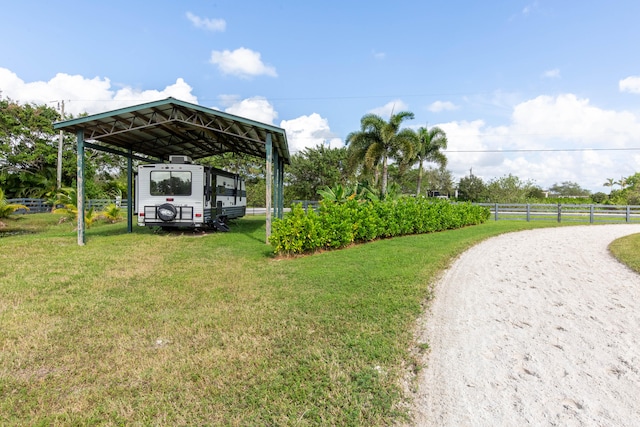 exterior space with a carport