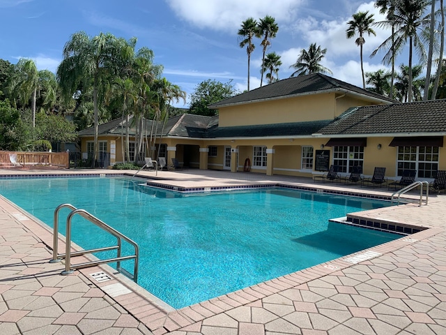 view of pool featuring a patio area