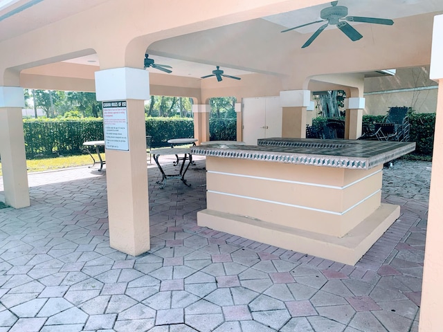 view of patio with ceiling fan