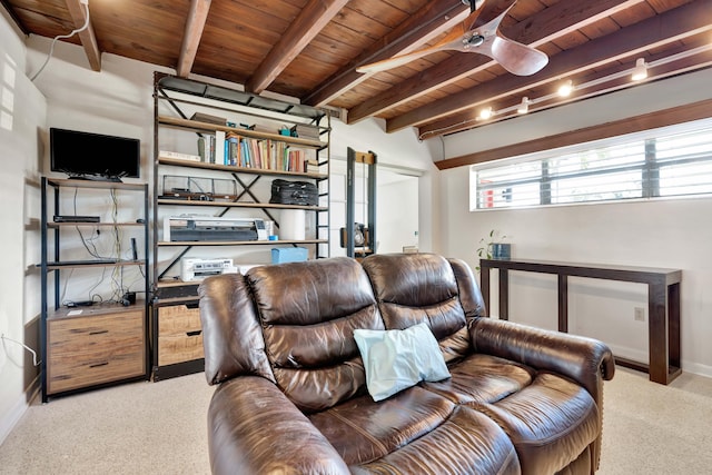 living room with beamed ceiling, wood ceiling, light carpet, and ceiling fan