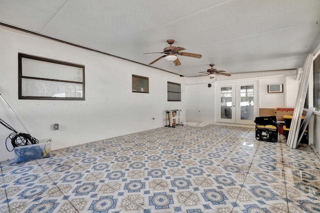 interior space featuring ceiling fan and french doors