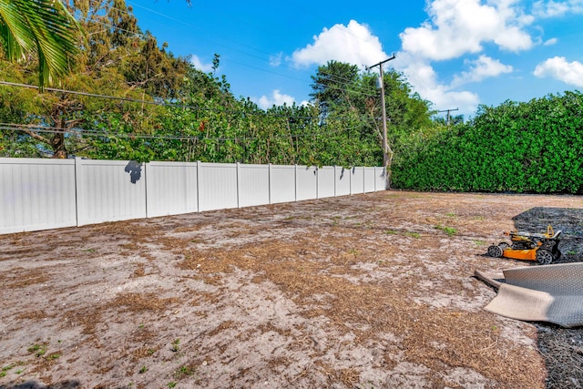 view of yard featuring fence