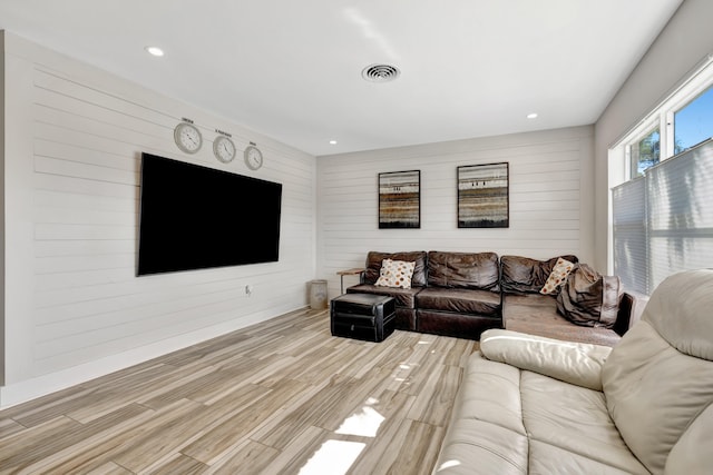 living room with light hardwood / wood-style floors