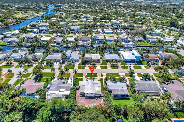 view of property location with nearby suburban area and a nearby body of water