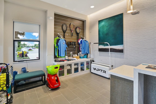 mudroom with light tile patterned flooring