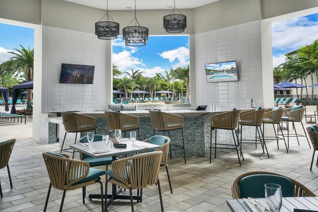 view of patio / terrace featuring an outdoor bar