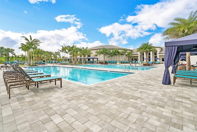 view of swimming pool featuring a patio