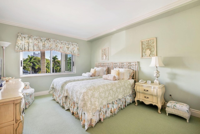 carpeted bedroom featuring crown molding