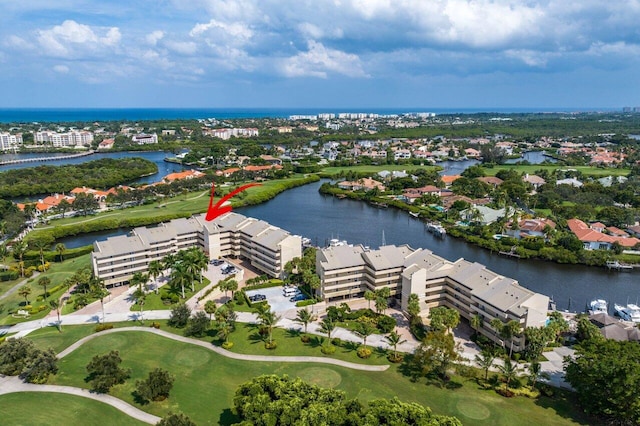 birds eye view of property featuring a water view