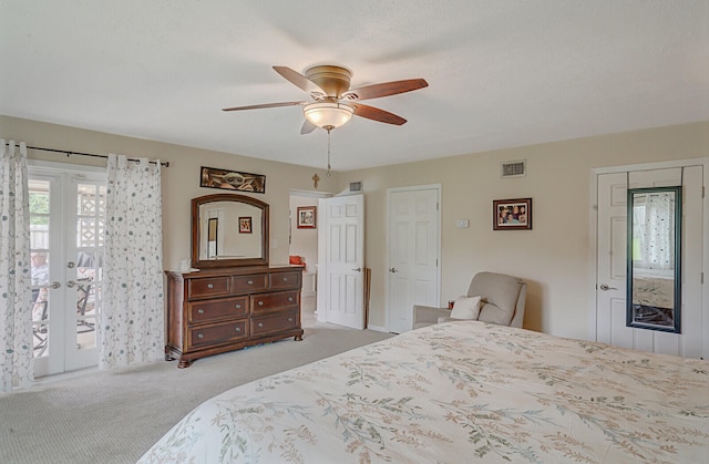 bedroom with light carpet, french doors, a textured ceiling, access to outside, and ceiling fan