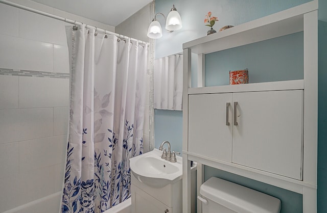 full bathroom featuring vanity, shower / bathtub combination with curtain, and toilet