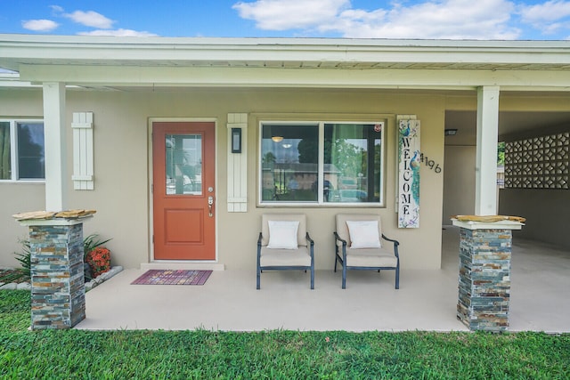 property entrance featuring a porch