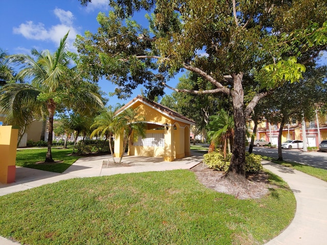 view of front of house with a front lawn