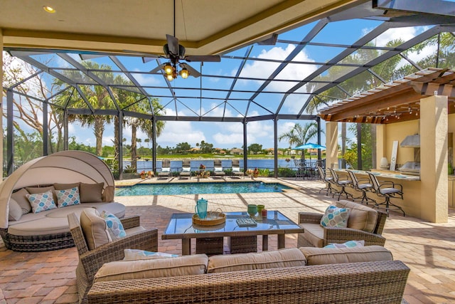 view of patio featuring an outdoor hangout area, a lanai, and ceiling fan