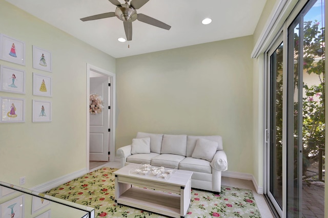 living room with ceiling fan