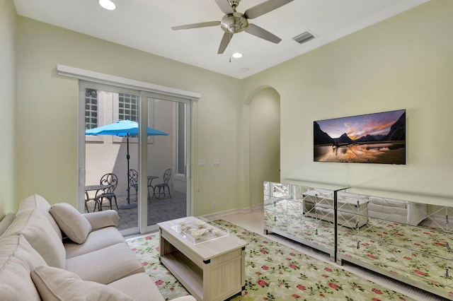 living room with ceiling fan