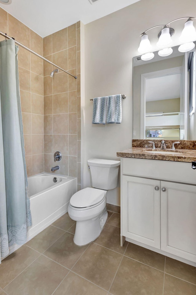 full bathroom with toilet, vanity, tile patterned floors, and shower / bathtub combination with curtain