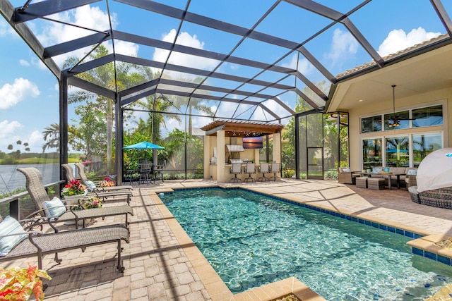 view of swimming pool featuring an outdoor living space, glass enclosure, and a patio area