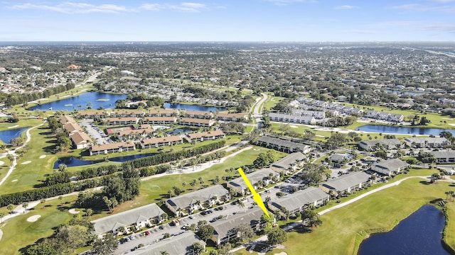 bird's eye view with golf course view and a water view