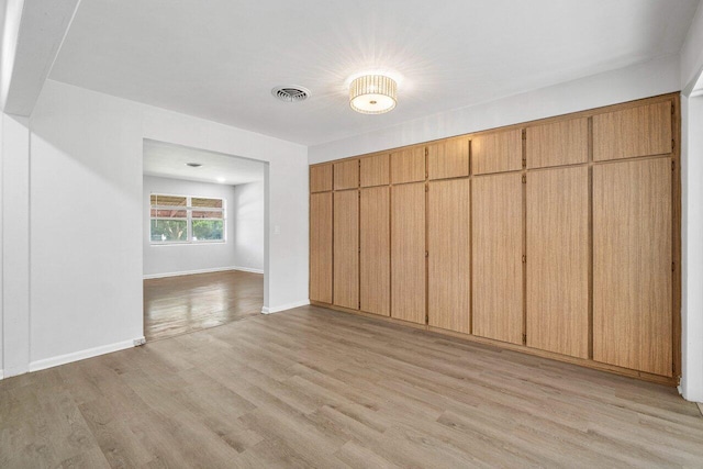 empty room featuring light hardwood / wood-style flooring