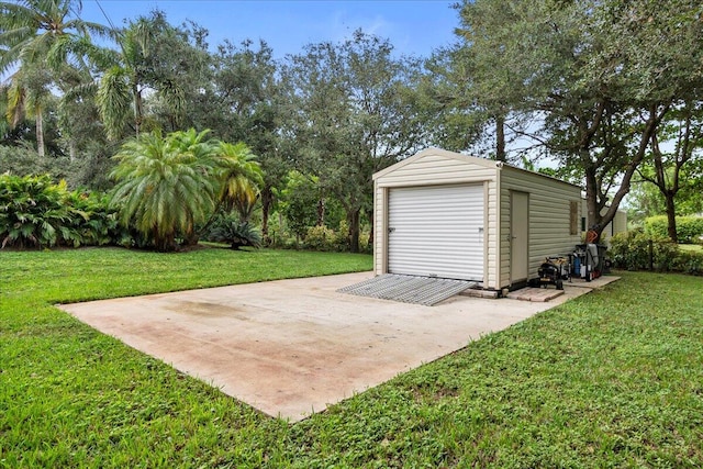 garage featuring a yard