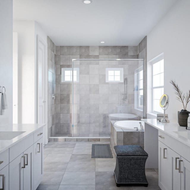 bathroom with vanity, tile patterned floors, and separate shower and tub