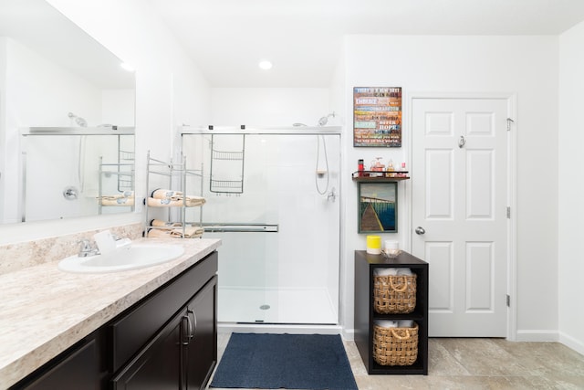 bathroom featuring vanity and walk in shower