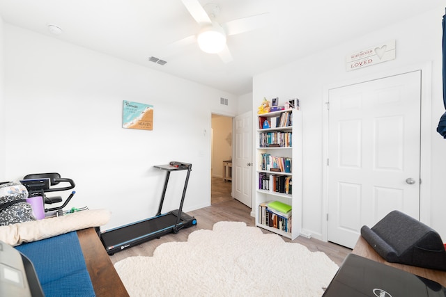 interior space with ceiling fan and light wood-type flooring