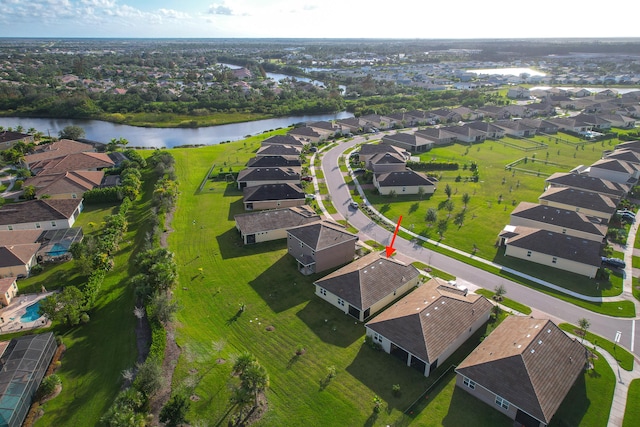 drone / aerial view featuring a water view