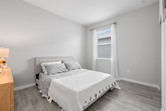 bedroom featuring light wood-type flooring