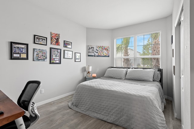 bedroom featuring hardwood / wood-style floors