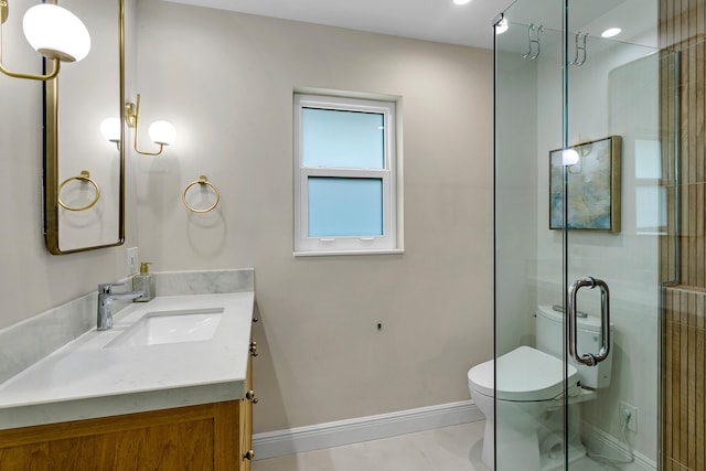 bathroom featuring walk in shower, vanity, and toilet