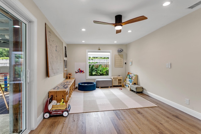 unfurnished room featuring hardwood / wood-style floors and ceiling fan