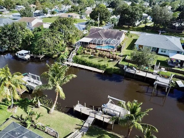 bird's eye view with a residential view and a water view